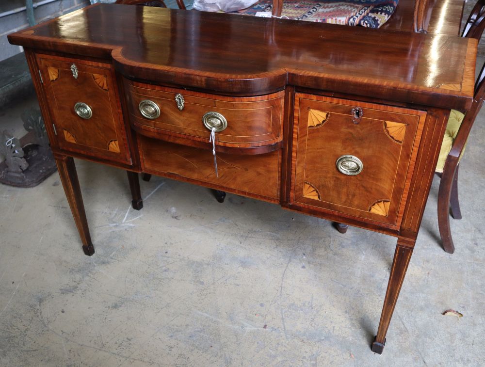 A George III satinwood banded and inlaid mahogany bowfront sideboard, width 129cm depth 53cm height 91cm